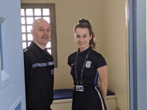DIVERT coach and police officer in custody cell